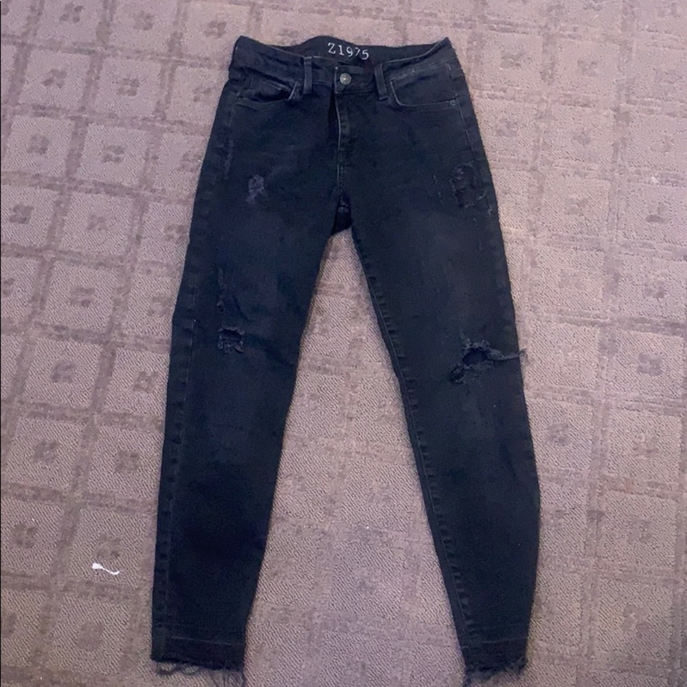 black ripped jeans